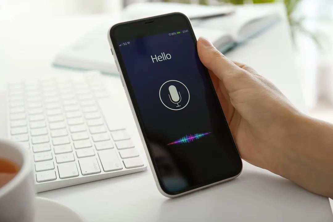 Professional consultant using Summary AI recorder app to capture key details from client meetings.