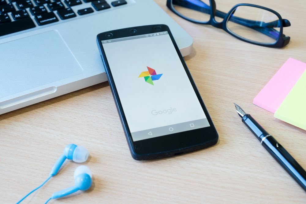 phone on desk with google app