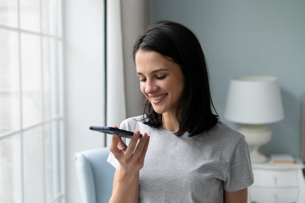 girl dictating a quick message on iphone