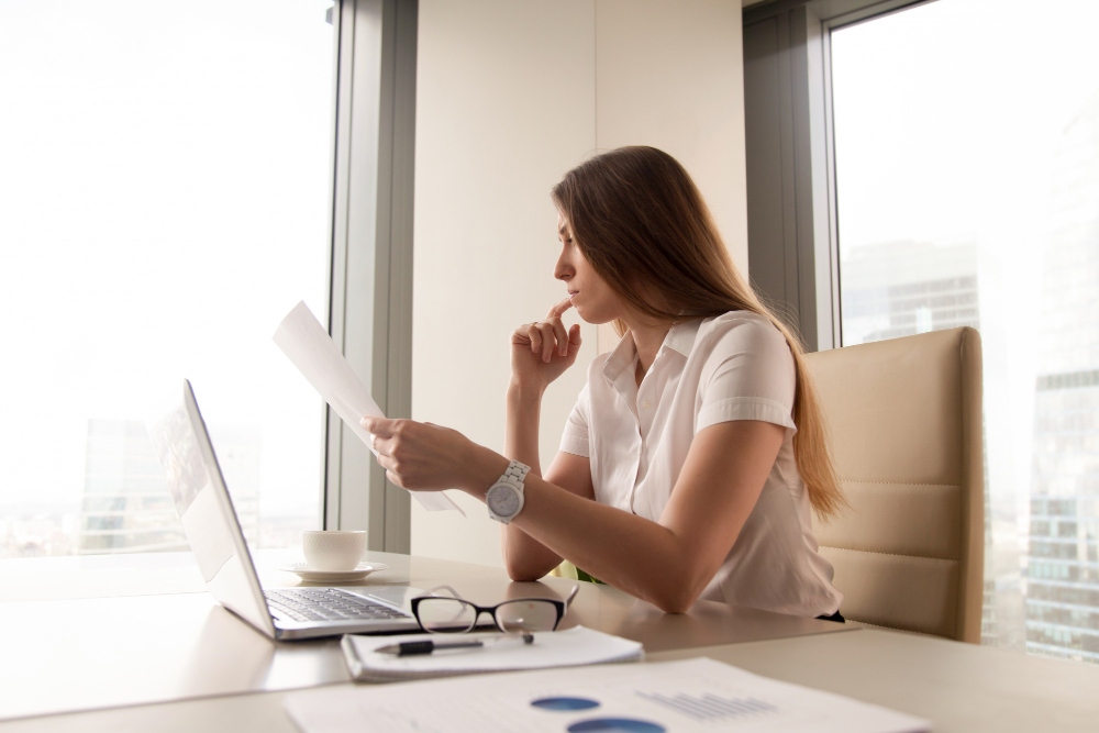 freelancer thinking of ways to boost their productivity with tools