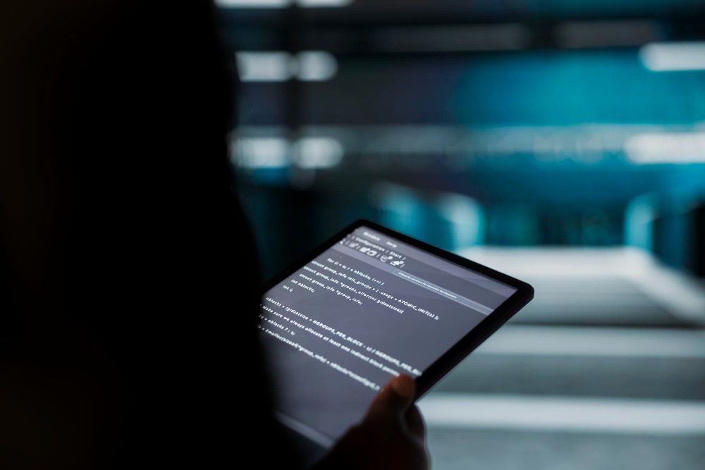 person holding tablet with chatgpt