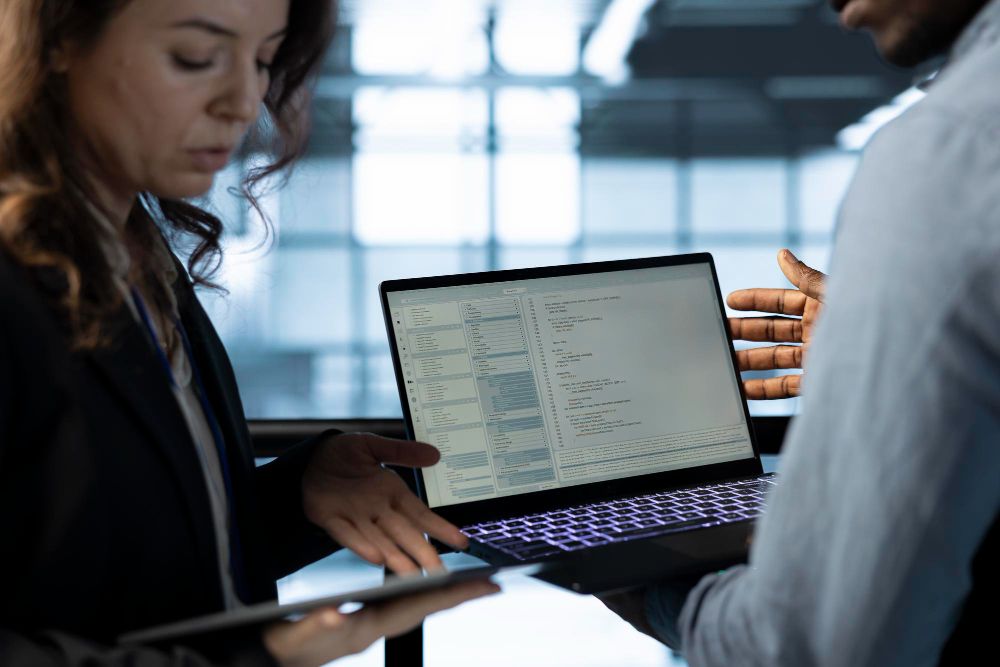 meeting minutes template on a laptop