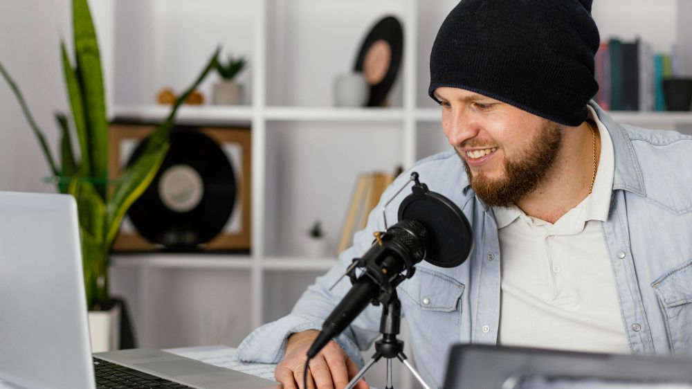 podcaster recording with microphone