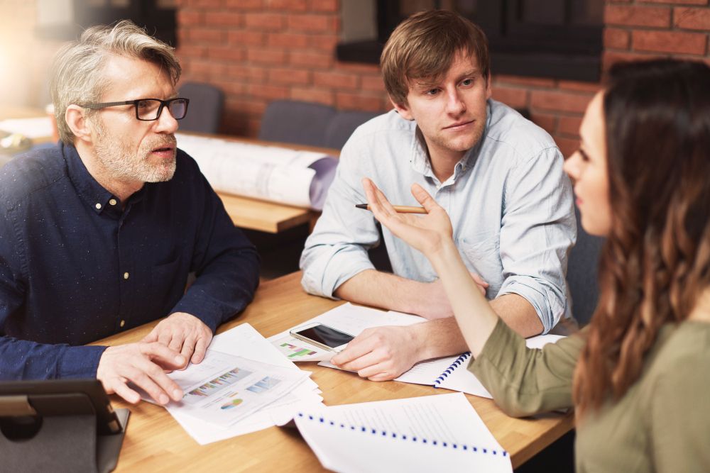 team discussing meeting agenda