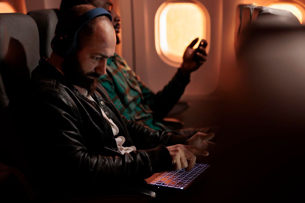 traveler using active noise canceling headphones