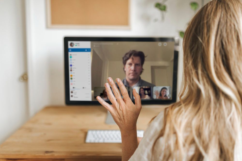 person using zoom host controls