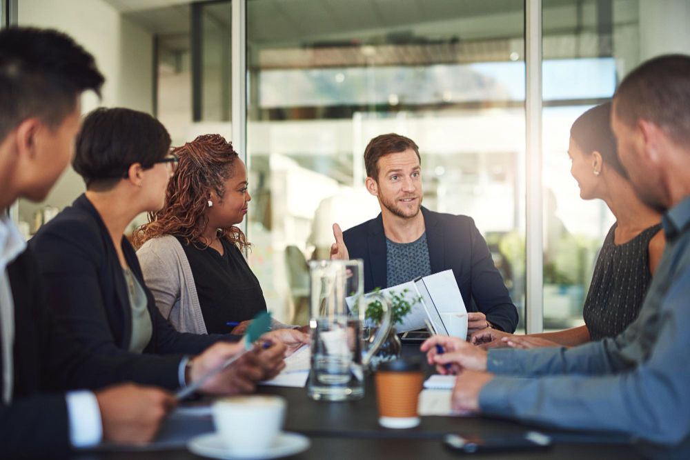 team discussing ideas during a business meeting