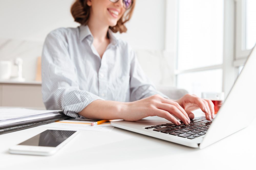 professional working on a laptop at desk