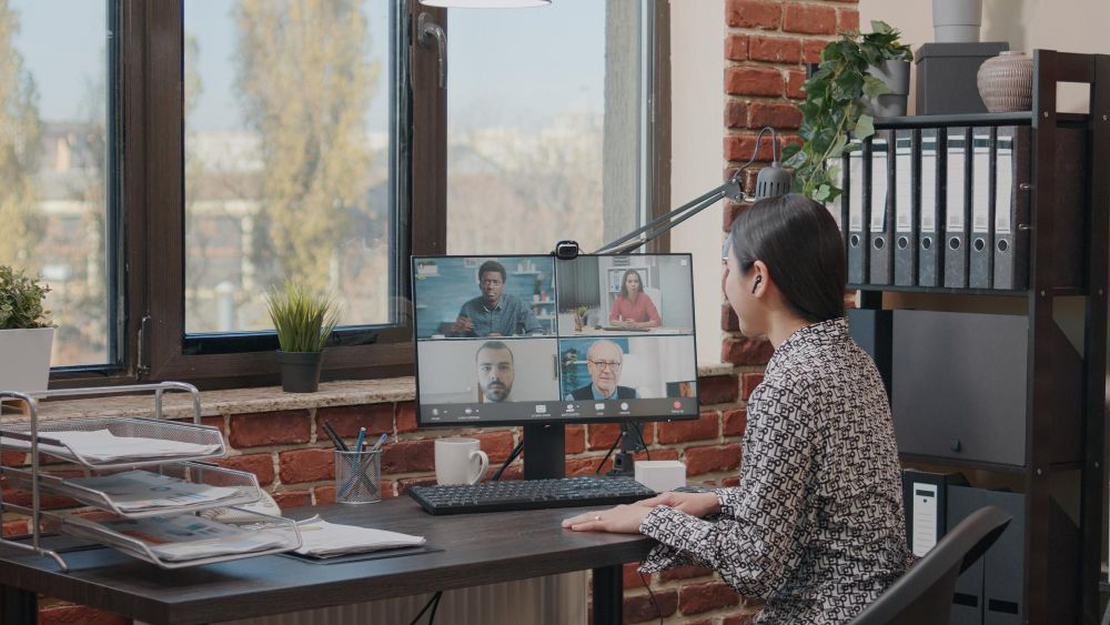 professional joining a remote video meeting