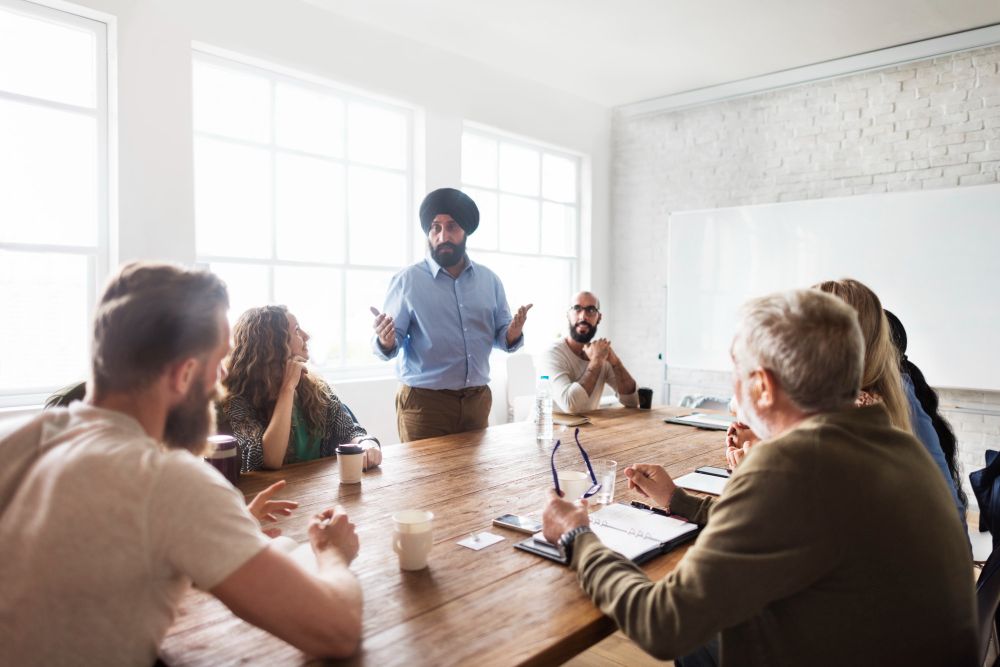 presenter leading a business team meeting